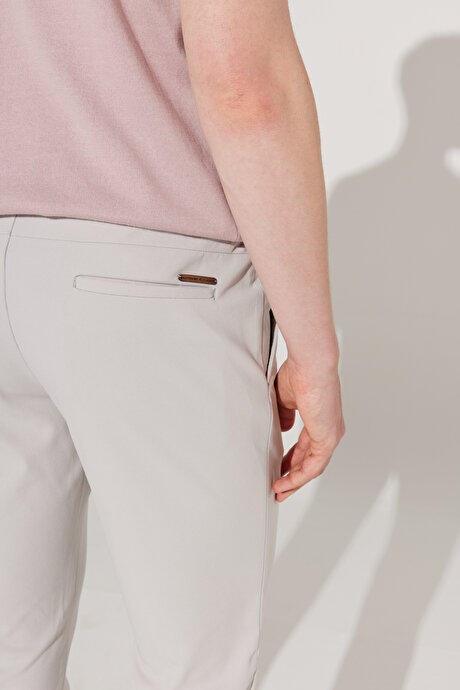 Slim Fit Dar Kesim Beli Bağlamalı Taş Pantolon resmi