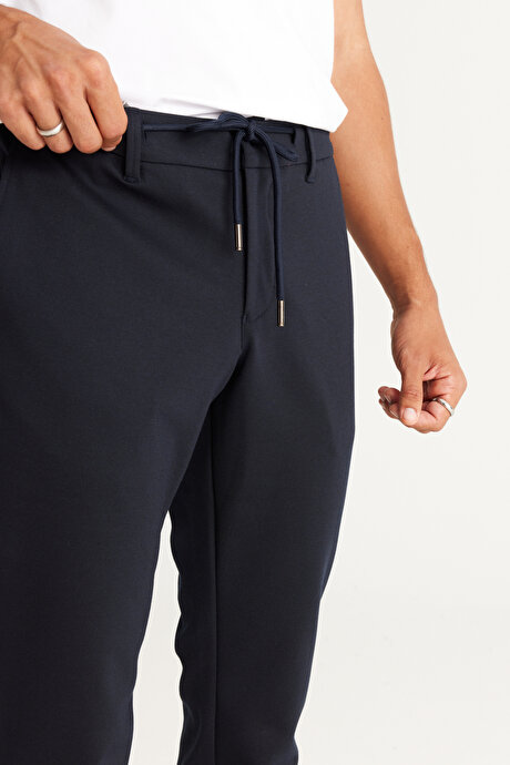Slim Fit Dar Kesim Yan Cepli Beli Lastikli Bağlamalı Lacivert Pantolon resmi