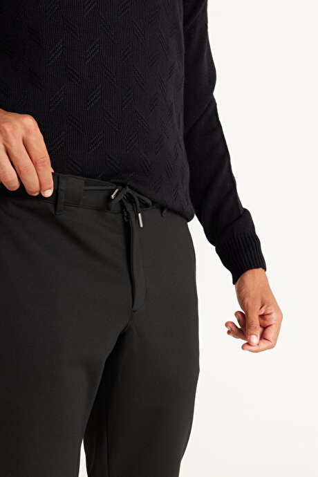 Slim Fit Dar Kesim Yan Cepli Beli Lastikli Bağlamalı Siyah Pantolon resmi
