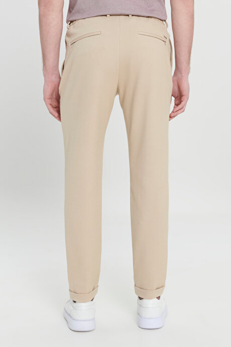 360 Derece Her Yöne Esneyen Slim Fit Dar Kesim Diagonal Desenli Beli Bağlamalı Örme Bej Pantolon resmi