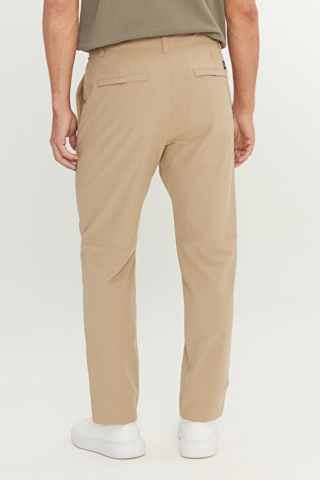 360 Her Yöne Esneyen Slim Fit Dar Kesim Yan Cep Bej Pantolon resmi