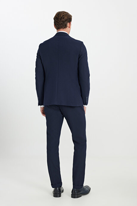 Slim Fit Dar Kesim Kırlangıç Yaka Beli Bağlamalı Gofre Desenli Lacivert Takım Elbise resmi