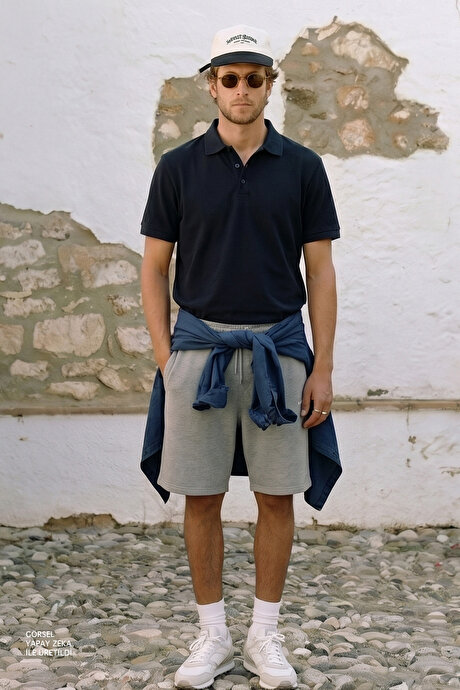 Slim Fit Dar Kesim Kıvrılmaz Polo Yaka Kısa Kollu Lacivert Tişört resmi