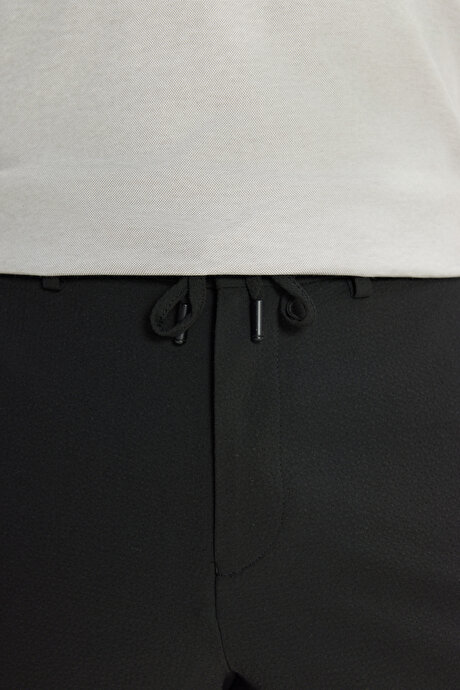 Slim Fit Dar Kesim Gofre Desenli Beli Bağlamalı Yan Cepli Travel Casual Siyah Pantolon resmi