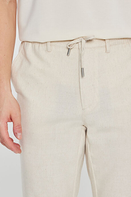 Pamuklu Slim Fit Dar Kesim Beli Bağlamalı Yan Cepli Esnek Bej Pantolon resmi