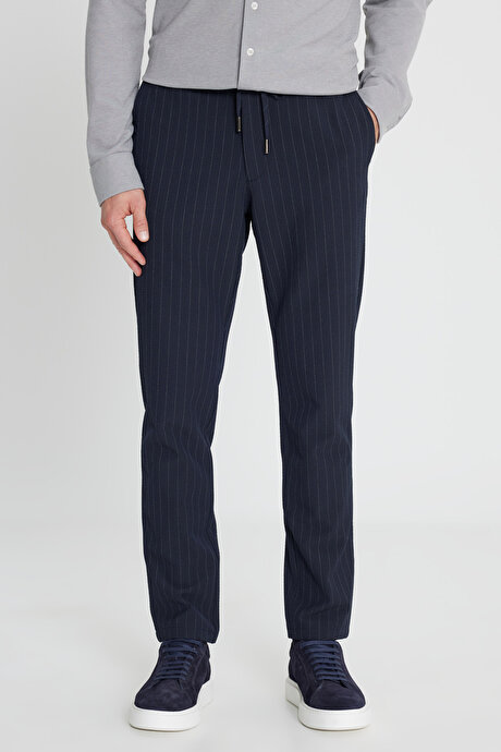 Yumuşak Dokulu Slim Fit Beli Bağlamalı Yan Cepli Gofre Desenli Lacivert Pantolon resmi