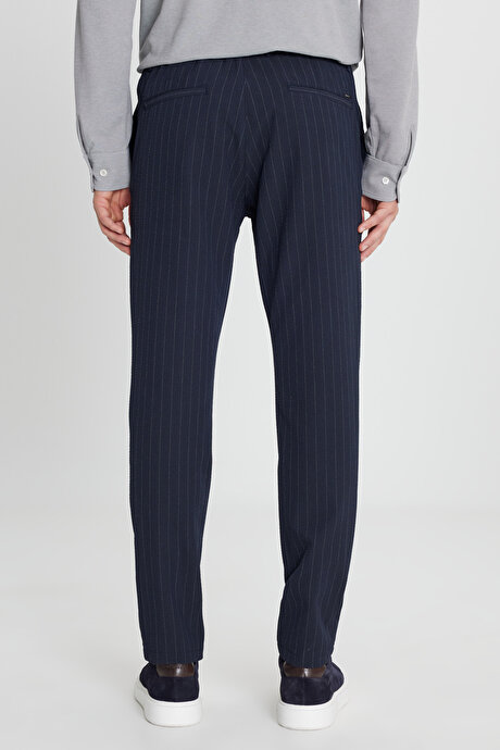 Yumuşak Dokulu Slim Fit Beli Bağlamalı Yan Cepli Gofre Desenli Lacivert Pantolon resmi