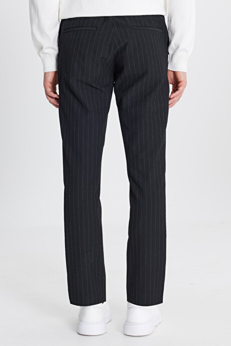Yumuşak Dokulu Slim Fit Beli Bağlamalı Yan Cepli Gofre Desenli Siyah Pantolon resmi