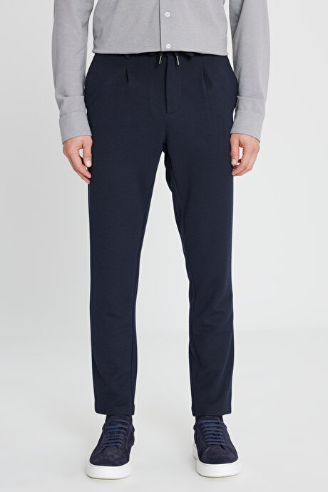 360 Her Yöne Esneyen Slim Fit Dar Kesim Beli Bağlamalı Armürlü Casual Lacivert Pantolon resmi