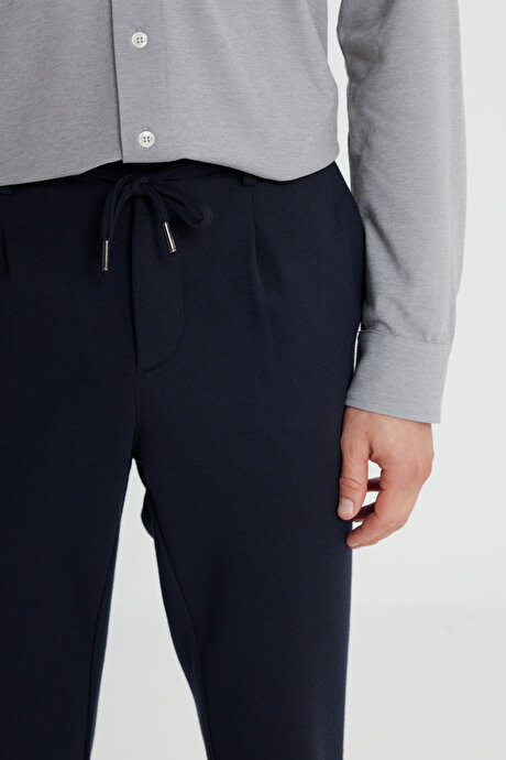 360 Her Yöne Esneyen Slim Fit Dar Kesim Beli Bağlamalı Armürlü Casual Lacivert Pantolon resmi