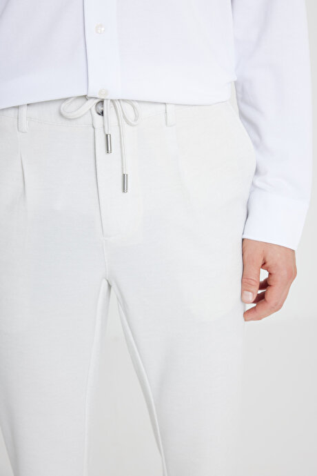 360 Her Yöne Esneyen Slim Fit Dar Kesim Beli Bağlamalı Armürlü Casual Taş Pantolon resmi