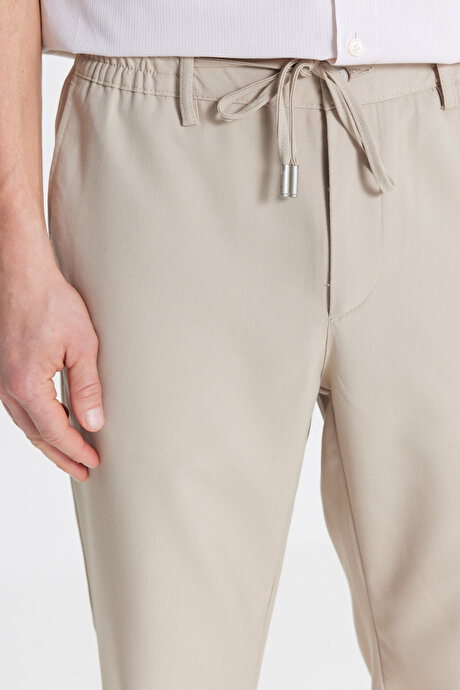 Slim Fit Dar Kesim Beli Bağlamalı Yan Cepli Bej Pantolon resmi