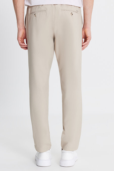 Slim Fit Dar Kesim Beli Bağlamalı Yan Cepli Bej Pantolon resmi