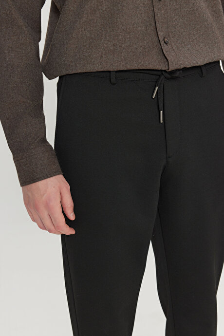 Jogger Slim Fit Dar Kesim Yan Cepli Beli Bağlamalı Casual Siyah Pantolon resmi