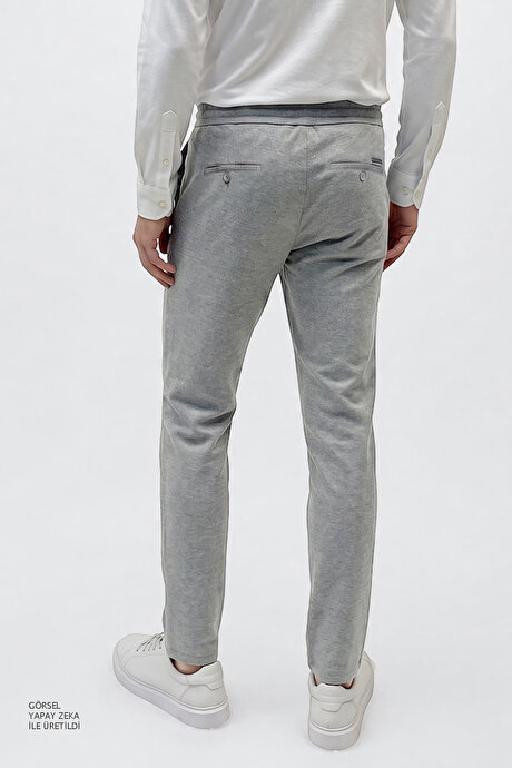 Slim Fit Dar Kesim Beli Bağlamalı Yan Cepli Esnek Jogger Açık Gri Pantolon resmi