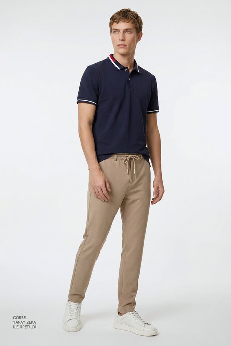 Jogger Slim Fit Dar Kesim Yan Cepli Beli Bağlamalı Bej Pantolon resmi