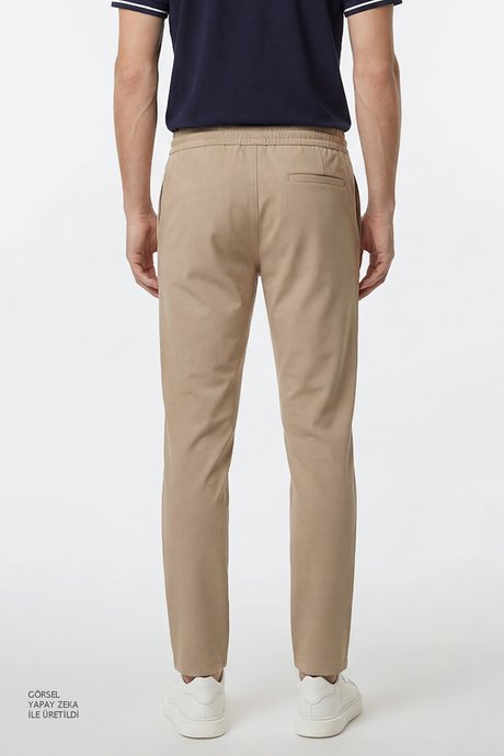 Jogger Slim Fit Dar Kesim Yan Cepli Beli Bağlamalı Bej Pantolon resmi