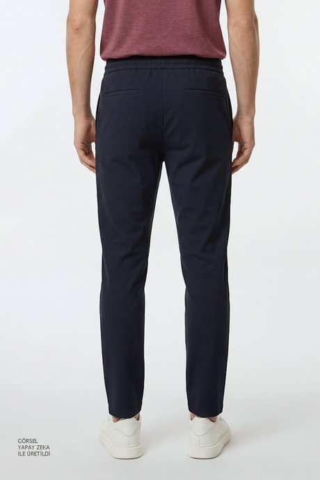 Jogger Slim Fit Dar Kesim Yan Cepli Beli Bağlamalı Lacivert Pantolon resmi