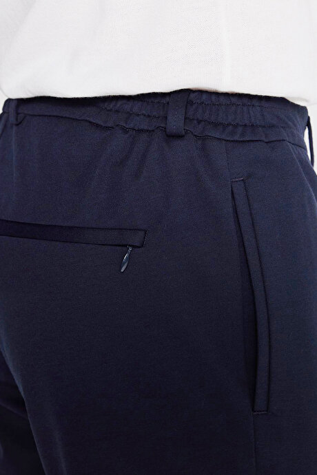 Slim Fit Dar Kesim Beli Bağlamalı Yan Cepli Armürlü Casual Lacivert Pantolon resmi