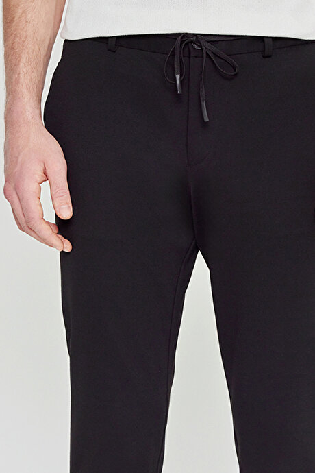Slim Fit Dar Kesim Beli Bağlamalı Yan Cepli Armürlü Casual Siyah Pantolon resmi