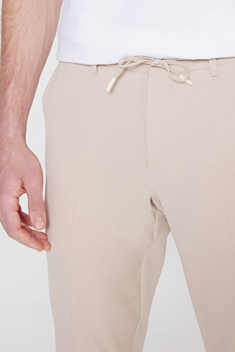 Slim Fit Dar Kesim Beli Bağlamalı Yan Cepli Casual Esnek Bej Pantolon resmi