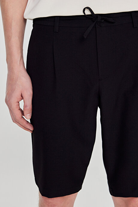 Slim Fit Dar Kesim Beli Bağlamalı Yan Cepli Düz Gofre Desenli Esnek Siyah Şort resmi