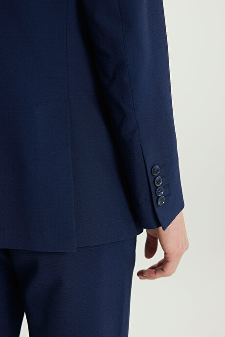 Slim Fit Dar Kesim Kırlangıç Yaka Gofre Desenli Kapak Cepli Esnek Lacivert Takım Elbise resmi