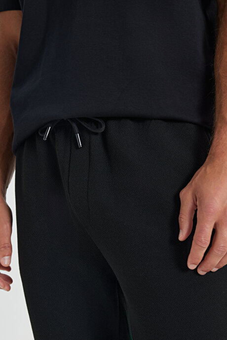Standart Fit Normal Kesim Cepli Esnek Örme Siyah Örme Pantolon resmi