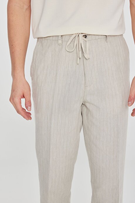 Pamuklu Keten Slim Fit Dar Kesim Beli Bağlamalı Çizgili Bej Pantolon resmi