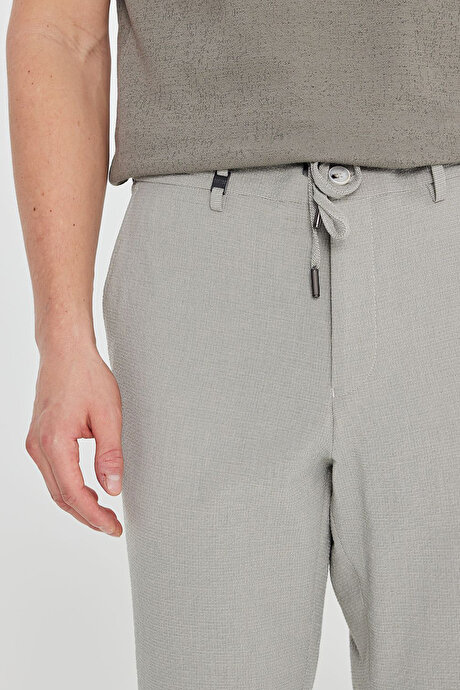 Slim Fit Dar Kesim Beli Bağlamalı Gofre Desenli Yan Cep Casual Gri Pantolon resmi