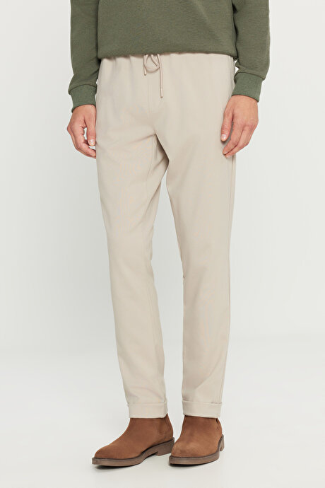 Slim Fit Rahat Kesim Beli Bağlamalı Yan Cepli Esnek Jogger Bej Pantolon resmi