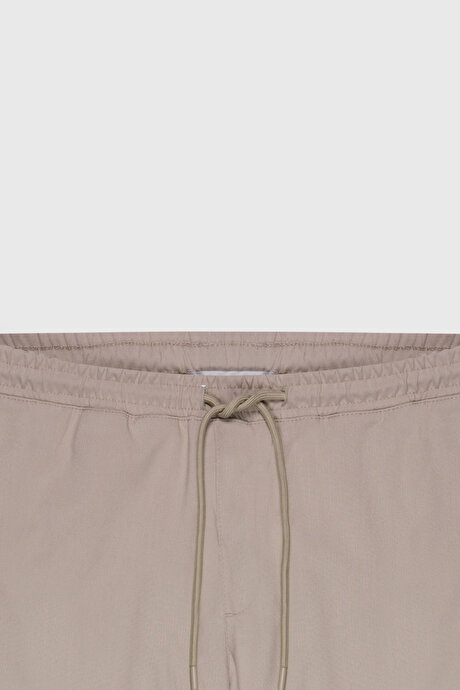 Non-Iron Ütü Gerektirmeyen Diz İzi Yapmayan Beli Bağlamalı Slim Fit Dar Kesim Jogger Bej Pantolon resmi