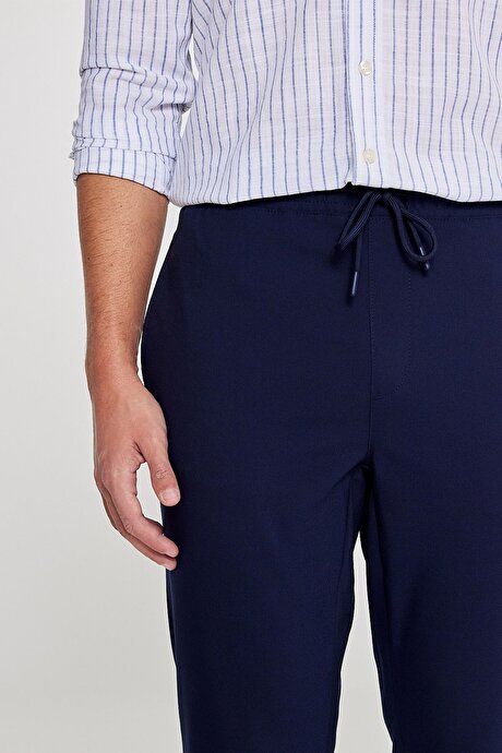 Slim Fit Rahat Kesim Beli Bağlamalı Yan Cepli Esnek Jogger Lacivert Pantolon resmi