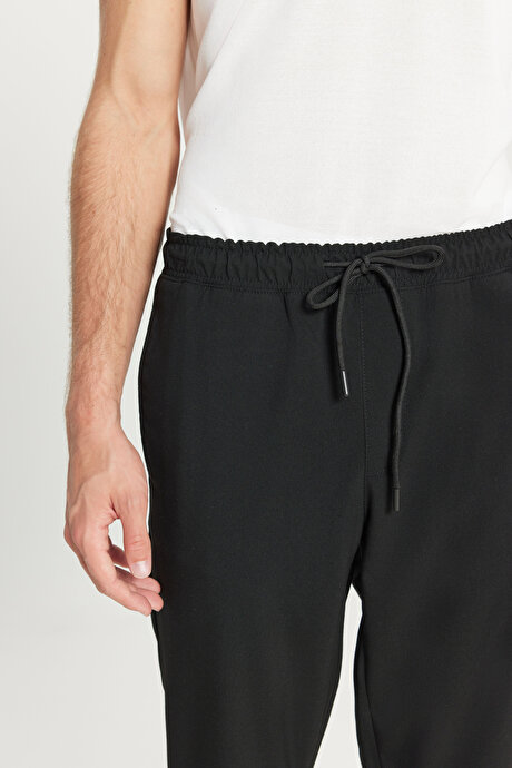Slim Fit Rahat Kesim Beli Bağlamalı Yan Cepli Esnek Jogger Siyah Pantolon resmi
