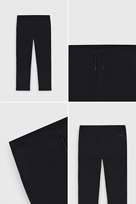 Non-Iron Ütü Gerektirmeyen Diz İzi Yapmayan Beli Bağlamalı Slim Fit Dar Kesim Jogger Siyah Pantolon resmi