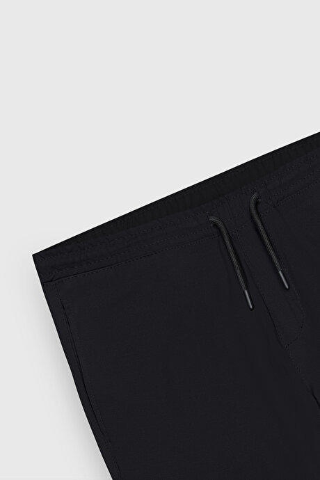 Non-Iron Ütü Gerektirmeyen Diz İzi Yapmayan Beli Bağlamalı Slim Fit Dar Kesim Jogger Siyah Pantolon resmi