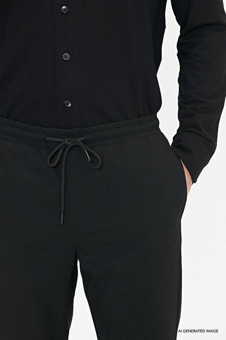 Non-Iron Ütü Gerektirmeyen Diz İzi Yapmayan Beli Bağlamalı Slim Fit Dar Kesim Jogger Siyah Pantolon resmi