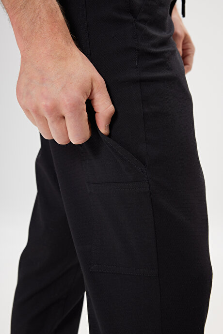 Oversize Bol Kesim Beli Bağlamalı Pamuklu Esnek Armürlü Yan Cepli Siyah Pantolon resmi