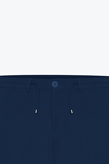Slim Fit Dar Kesim Beli Bağlamalı Yan Cep Gofre Desenli Lacivert Pantolon resmi