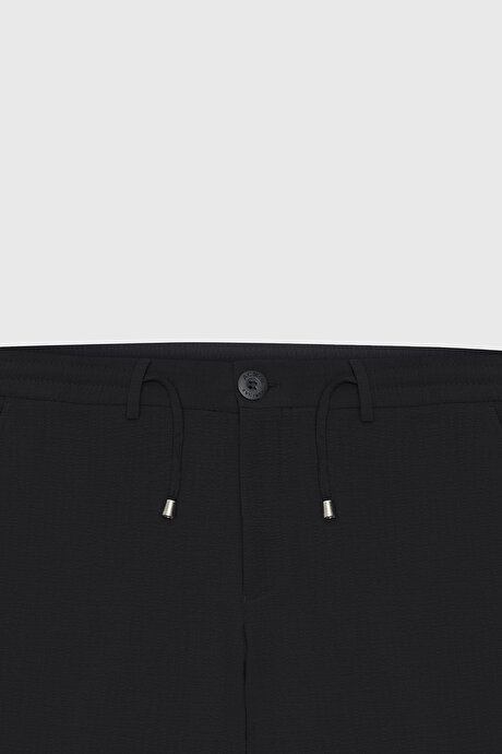 Slim Fit Dar Kesim Beli Bağlamalı Yan Cep Gofre Desenli Siyah Pantolon resmi