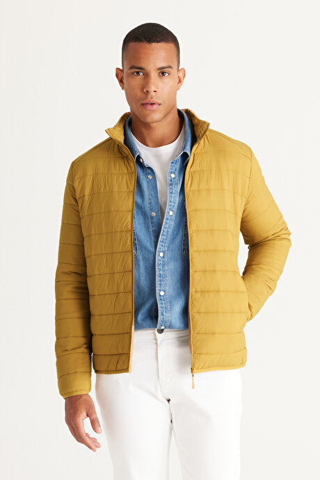 Rüzgar Geçirmez Sıcak Tutan Elyaf Dolgulu Ultra Hafif Standart Fit Şişme Sarı Mont resmi