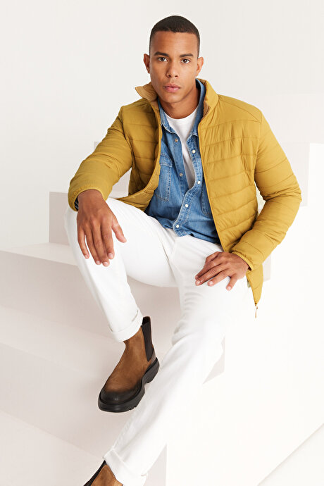 Rüzgar Geçirmez Sıcak Tutan Elyaf Dolgulu Ultra Hafif Standart Fit Şişme Sarı Mont resmi