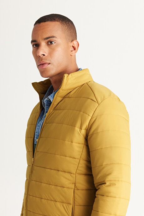 Rüzgar Geçirmez Sıcak Tutan Elyaf Dolgulu Ultra Hafif Standart Fit Şişme Sarı Mont resmi