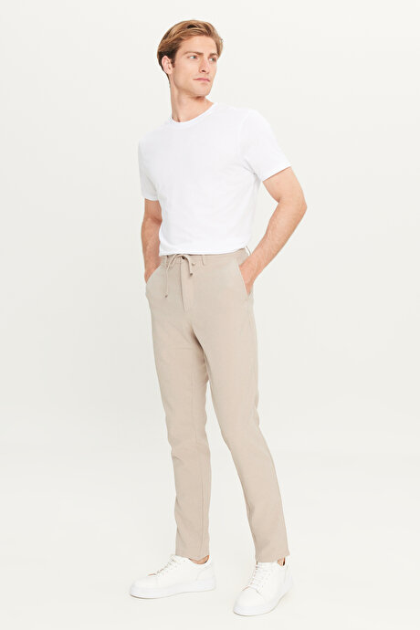 Slim Fit Dar Kesim Beli Bağlamalı Çizgili Yan Cepli Casual Jogger Bej Pantolon resmi