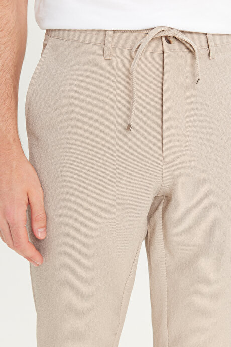 Slim Fit Dar Kesim Beli Bağlamalı Çizgili Yan Cepli Casual Jogger Bej Pantolon resmi