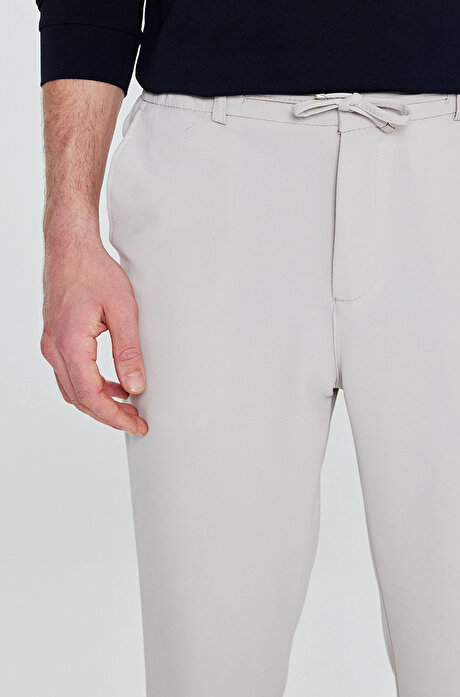Slim Fit Dar Kesim Beli Bağlamalı Yan Cepli Casual Jogger Taş Pantolon resmi