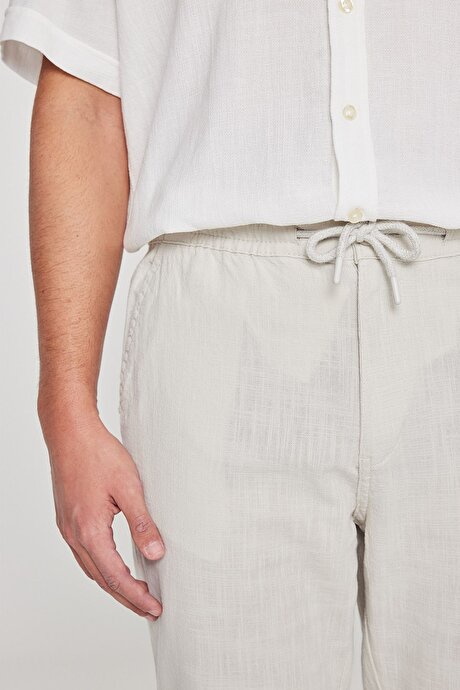 %100 Pamuk Slim Fit Dar Kesim Beli Bağlamalı Yan Cepli Taş Pantolon resmi