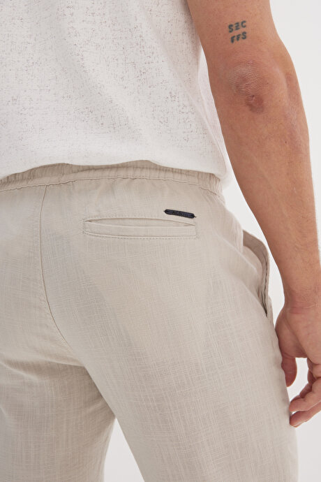 %100 Pamuk Slim Fit Dar Kesim Beli Bağlamalı Yan Cepli Taş Pantolon resmi