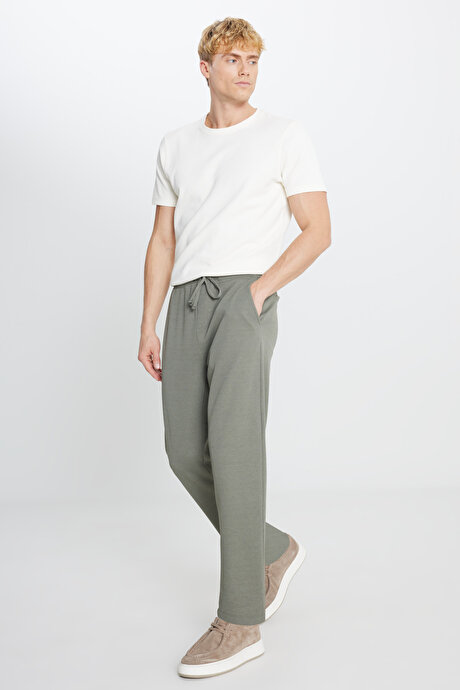 Pamuklu Standart Fit Normal Kesim Beli Lastikli Diagonal Desenli Örme Haki Pantolon resmi