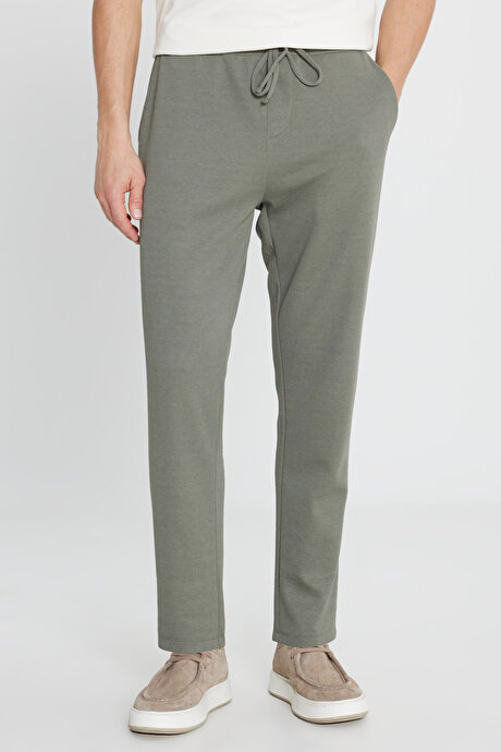 Pamuklu Standart Fit Normal Kesim Beli Lastikli Diagonal Desenli Örme Haki Pantolon resmi